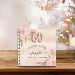 Guest book 60th birthday pampas grass rose gold<br><div class="desc">For an elegant 60th birthday party. A rose gold,  blush pink rustic faux metallic looking background. Decorated with rose gold,  pink florals,  pampas grass. Personalise and add a name and date.</div>