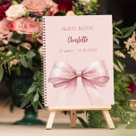Guest book blush pink bow birthday<br><div class="desc">A blush pink background colour. Decorated with a large pink bow.  Personalise and add your name,  age.</div>