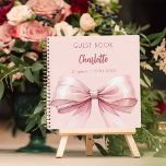Guest book blush pink bow birthday<br><div class="desc">A blush pink background colour. Decorated with a large pink bow.  Personalise and add your name,  age.</div>
