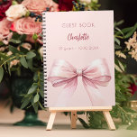 Guest book blush pink bow birthday<br><div class="desc">A blush pink background colour. Decorated with a large pink bow.  Personalise and add your name,  age.</div>