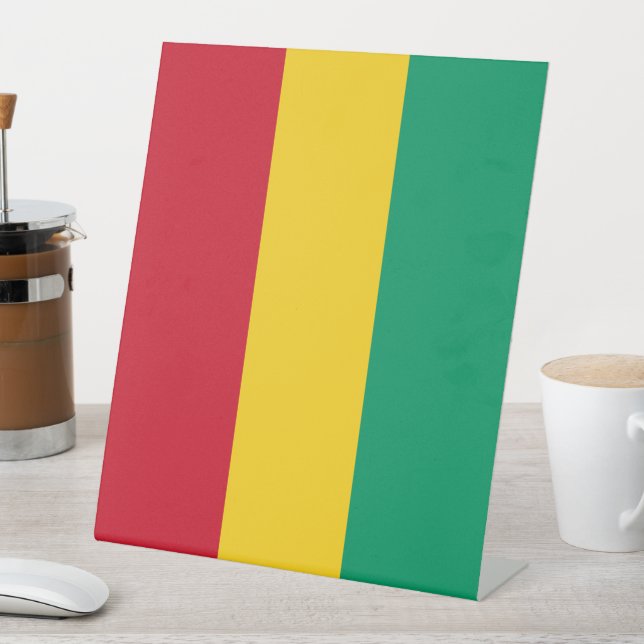 Guinea flag pedestal sign (In SItu)