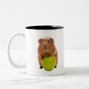 guinea pig and green apple Two-Tone coffee mug