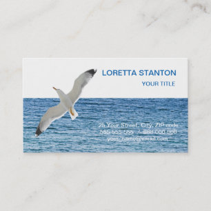 Gull flying above a sea business card