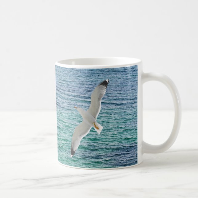 Gull flying above a sea coffee mug (Right)