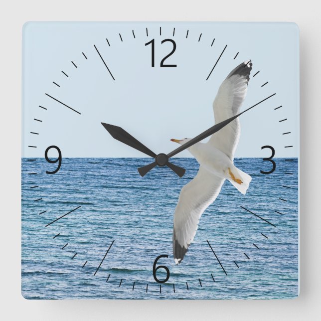 Gull flying above a sea square wall clock (Front)