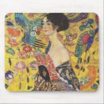 Gustav Klimt Lady With Fan Art Nouveau Painting Mouse Pad<br><div class="desc">Gustav Klimt Lady With Fan Art Nouveau Painting This half portrait of a beautiful woman shows a yellow background with asiatic ornaments, colourful birds and lotus flowers. The lady wears a dress in the style of a kimono imprinted with motives of a Chinese dragon dress. Beautiful artistic romantic decorative fine...</div>