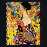 Gustav Klimt Lady with Fan Notebook<br><div class="desc">Notebook featuring Gustav Klimt’s oil painting Lady with Fan (1918). A woman wearing a blue kimono holds a red fan against a colourful yellow background of flowers and peacocks. A great gift for fans of Japonisme and European art.</div>