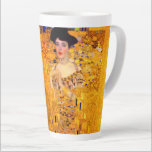Gustav Klimt Portrait of Adele Bloch Bauer Latte Mug<br><div class="desc">Latte Mug featuring Gustav Klimt’s oil painting Portrait of Adele Bloch Bauer I (1907). A beautiful woman wears a golden and geometric dress in front of a gold background. A great gift for fans of Art Nouveau and Austrian art.</div>