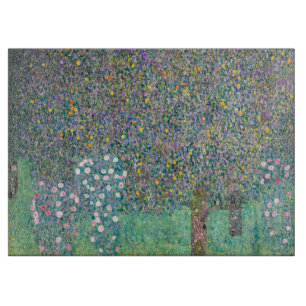 Gustav Klimt - Rosebushes under the Trees Cutting Board