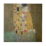 Gustav Klimt - The Kiss Tile<br><div class="desc">Famous painting by Gustav Klimt. The Kiss is one of the greatest romantic paintings and a great gifts for Valentine's day and other romantic occasions. Amazing masterpiece of symbolism and a great work by Gustav Klimt.</div>