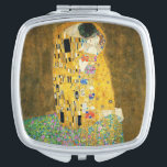 Gustav Klimt The Kiss Vintage Art Nouveau Painting Makeup Mirror<br><div class="desc">Gustav Klimt The Kiss Vintage Art Nouveau Painting The Kiss (In German: Der Kuss) was painted by the Austrian Symbolist painter Gustav Klimt between 1907 and 1908, the highpoint of his Golden Period, when he painted a number of works in a similar gilded style. The painting is widely considered a...</div>