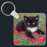 Gustav Klimt Tuxedo Cat Key Ring<br><div class="desc">Keychain featuring a Gustav Klimt tuxedo cat! This adorable black and white kitty sits in a field of red,  blue,  white,  and orange flowers. An awesome gift for cat lovers and Austrian art enthusiasts!</div>