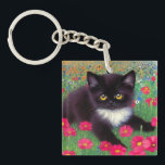 Gustav Klimt Tuxedo Cat Key Ring<br><div class="desc">Keychain featuring a Gustav Klimt tuxedo cat! This adorable black and white kitty sits in a field of red,  blue,  white,  and orange flowers. An awesome gift for cat lovers and Austrian art enthusiasts!</div>
