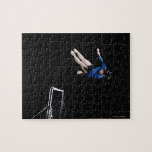 Gymnast (16-17) dismounting uneven bars jigsaw puzzle