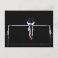 Gymnast (9-10) reaching for uneven bars