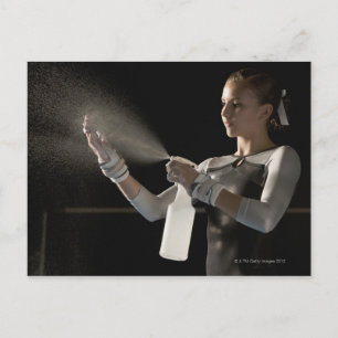 Gymnast spraying water on hands postcard