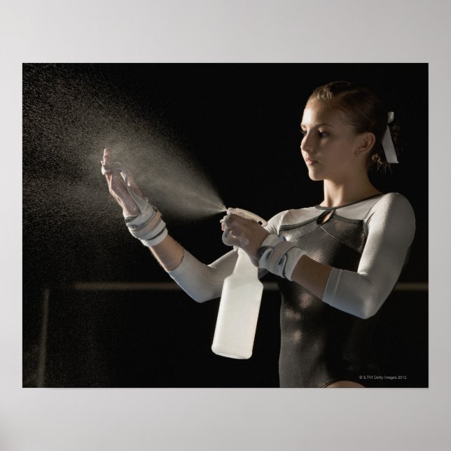Gymnast spraying water on hands poster (Front)