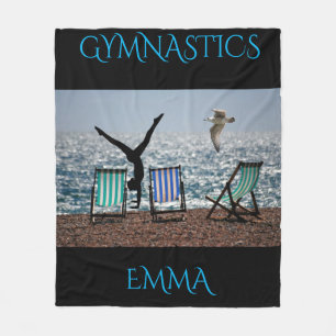 Gymnastics fleece blanket with personalized name.