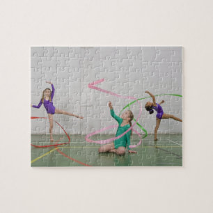 Gymnastics girls dancing with ribbons jigsaw puzzle