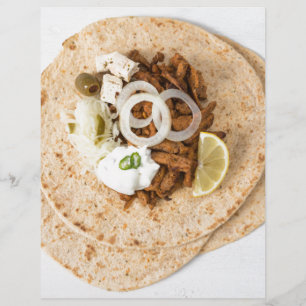 Gyros pita with tzatziki coleslaw olives and feta
