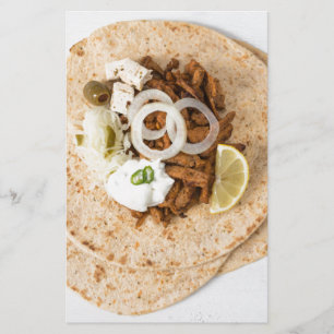 Gyros pita with tzatziki coleslaw olives and feta