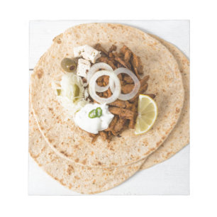 Gyros pita with tzatziki coleslaw olives and feta notepad