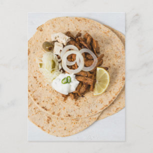 Gyros pita with tzatziki coleslaw olives and feta postcard