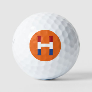 H Monogram overlaid on NLD Flag on or be6 gbcnt Golf Balls