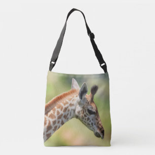 Half Face of Giraffe. Africa, Serengeti Crossbody Bag