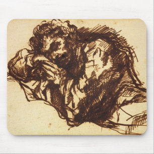Half length portrait of a man bending over mouse pad