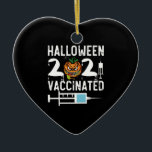 Halloween 2021 Vaccinated Funny Costume Ceramic Ornament<br><div class="desc">Halloween 2021 Vaccinated Funny Costume
vaccinated, vaccine, halloween, 2021, gift, ideas, scary, pumpkin, birthday, halloween trick or treat, spooky, horror, zombie, black, ghost, trick or treat, witch, skull, humour, vintage, retro, gifts</div>