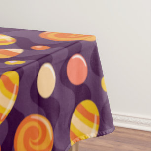Halloween Candy Corn Candies on Purple Tablecloth