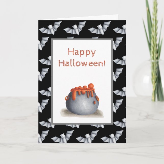 Halloween card with a cauldron and bat background (Front)