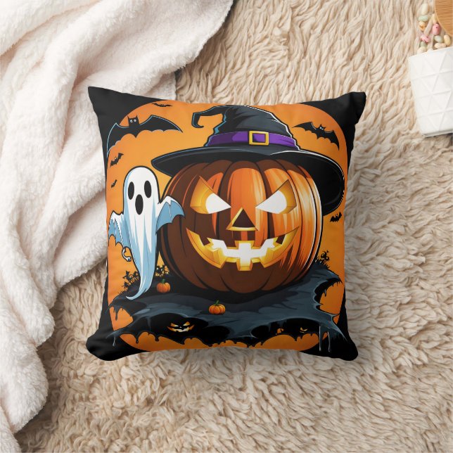 Halloween ghost floats beside a carved pumpkin cushion (Blanket)