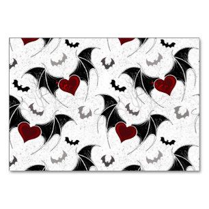 Halloween heart with black bat wings table number