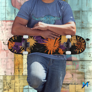 Halloween-Inspired Graffiti with Sunburst Patterns Skateboard