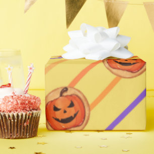 Halloween Jack-O-Lantern Pumpkin Cookie on Yellow Wrapping Paper