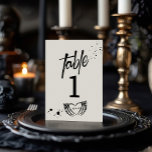Halloween Night of the Living Wed Wedding Table Number<br><div class="desc">This design measures 5 x 7 inches/ 12.7 x 17.8 cm and is perfect for table numbers. Set the tone for your darkly romantic day with our Gothic Skeleton Grunge wedding collection. Featuring bold black and white designs with edgy skeleton motifs, our invitations, signs, and decor add a touch of...</div>