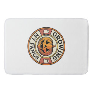 Halloween Pumpkin Growing My Fangs Vintage Badge_1 Bath Mat
