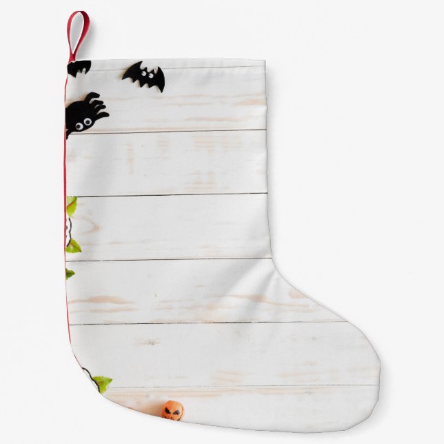 Halloween pumpkins, bats, spider top view. small christmas stocking (Front)