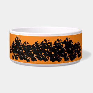 Halloween scary skulls pile black orange pattern