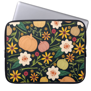 Halloween seamless pattern with flowers,pumpkins a laptop sleeve