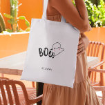Halloween Trick or Treat Whimsical Cute Ghost Boo Tote Bag<br><div class="desc">Goofy-cute ghost BOO for your Halloween. A simple design with goofy ghost saying BOO! Trick or treat fun will be had by all with this whimsical design. Happy Halloween fun with a cute ghost with pink checks with cute script saying "Boo", Personalise for yourself wih your name . This design...</div>