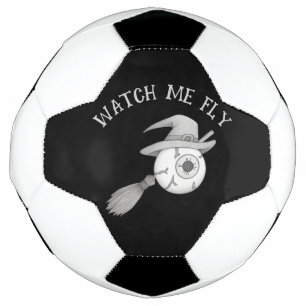 Halloween witch broom and scary eyeball soccer ball