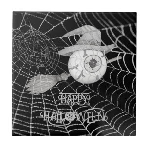 Halloween witch broom, scary eyeball, spider web ceramic tile