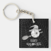 Halloween witch broom, scary eyeball, spider web