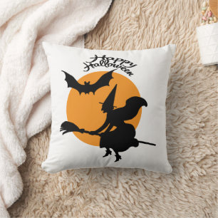 Halloween witch on broomstick with bat, witch cushion