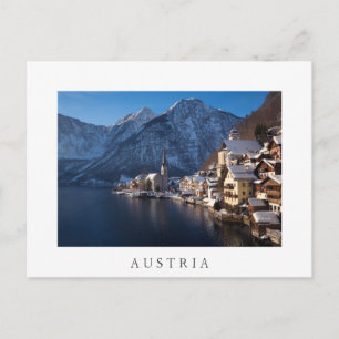 Hallstatt town in the snow in winter postcard