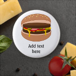Hamburger in Bun Image - Add Your Text 6 Cm Round Badge<br><div class="desc">Customise this cartoon-style hamburger graphic. Shows a juicy burger in a bread bun,  with melting cheese and salad filling. Personalise with a name,  business brand or humourous slogan.</div>