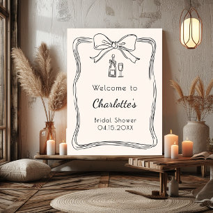 Hand drawn bow frame bridal shower welcome sign